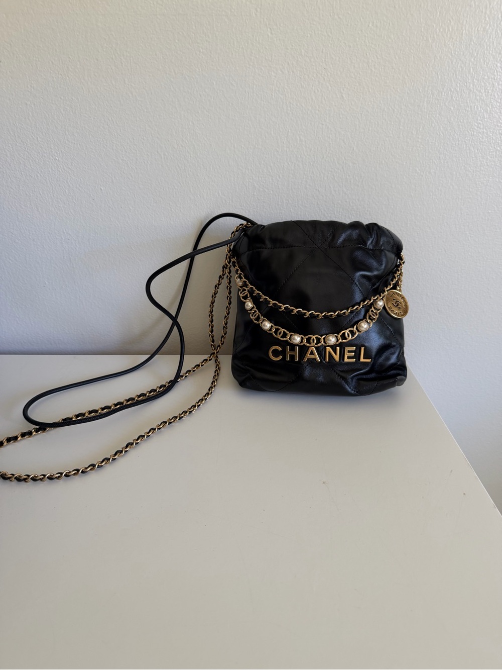 CHANEL Black Leather Quilted Mini Crossbody with Gold Chain Logo